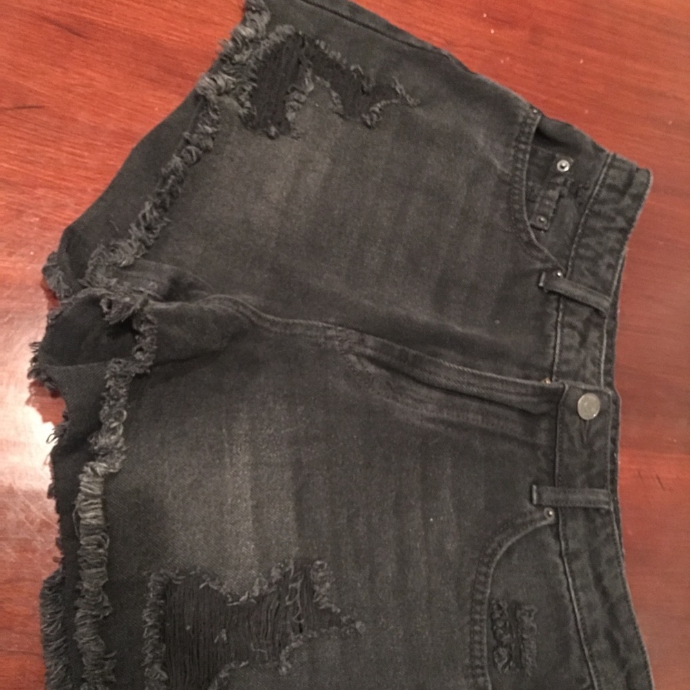 Black ripped shorts